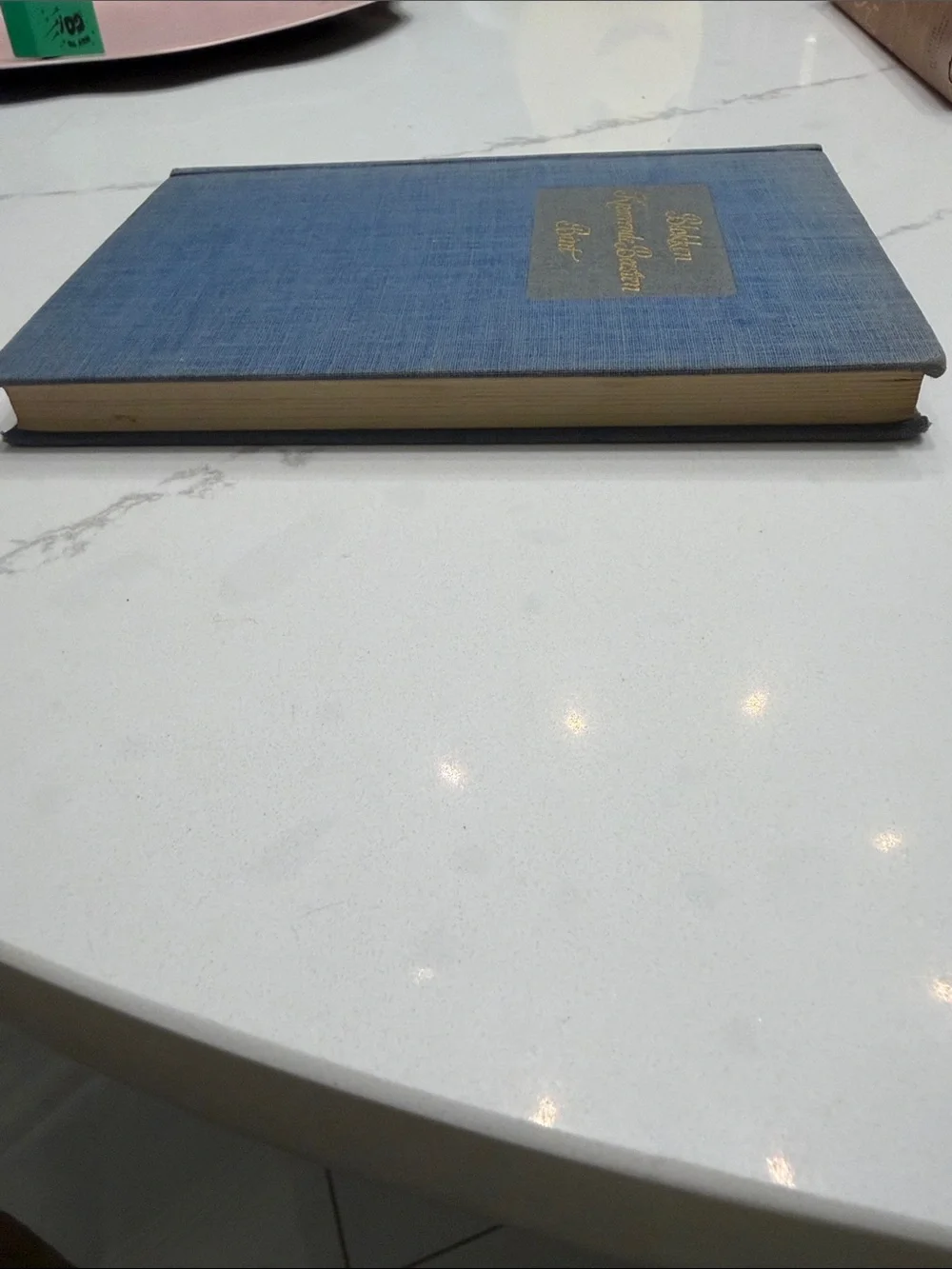 Blue Clothbound Book with Gold Script Title